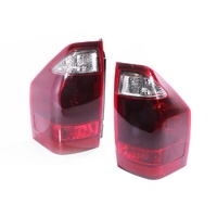 PAIR Tail Lights to suit Mitsubishi Pajero 02-06 NP Wagon Dark Red & Clear Lense
