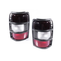 Pair Tail Lights to suit Mitsubishi Pajero 91-97 NH NJ NK Tinted Red & Clear