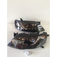 Head Lights Set to suit Ford Falcon BF2 and BF3 Black Projector DRL 09/2006- Onwards Wagon Sedan Ute